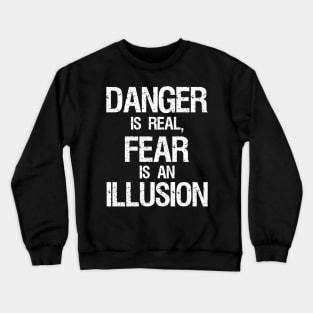 Danger is real, fear is an illusion. Crewneck Sweatshirt